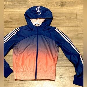 Woman’s pink and blue Adidas Neo track jacket